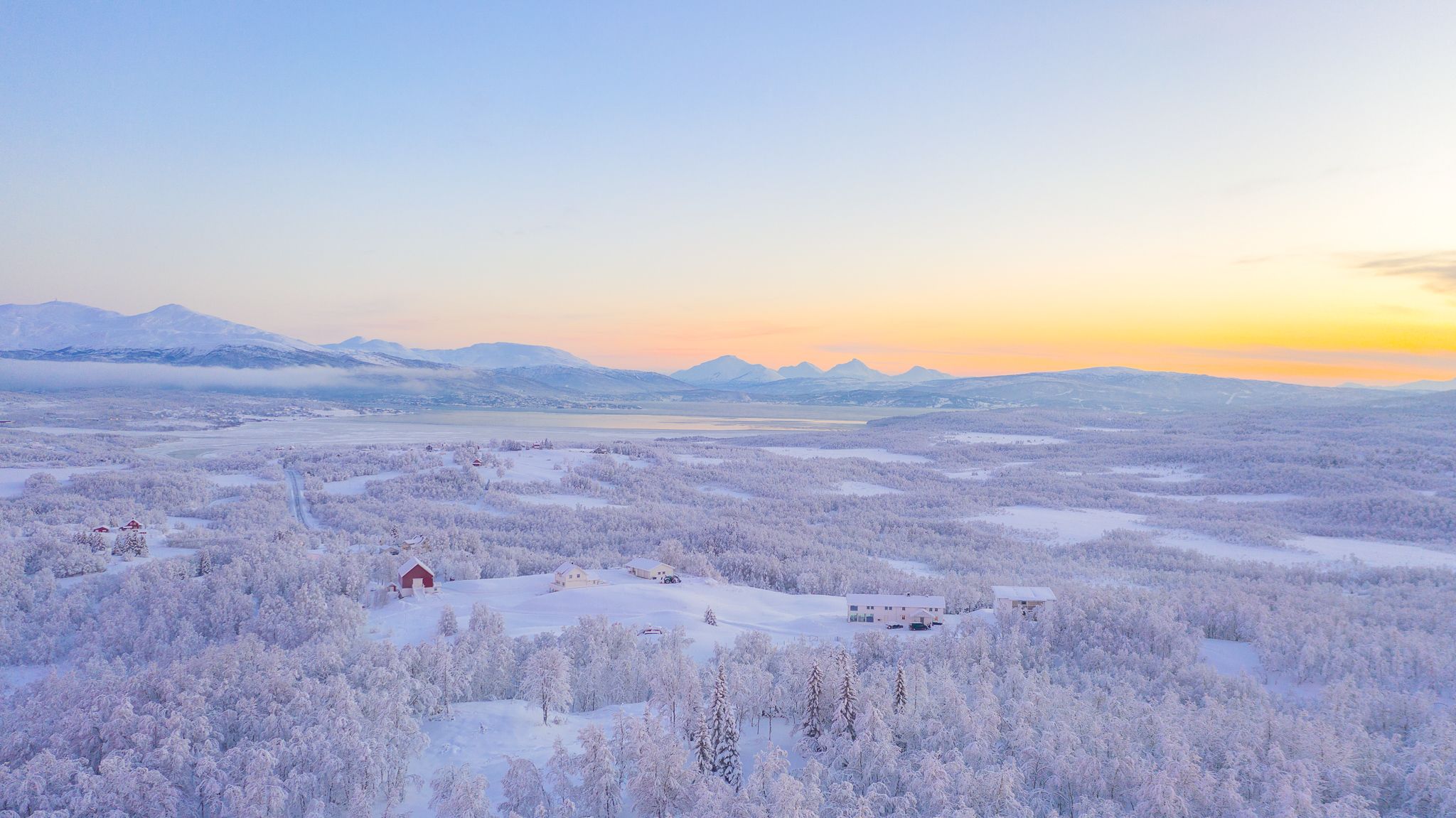 Snowshoeing in the winter landscape around Aurora Borealis Observatory